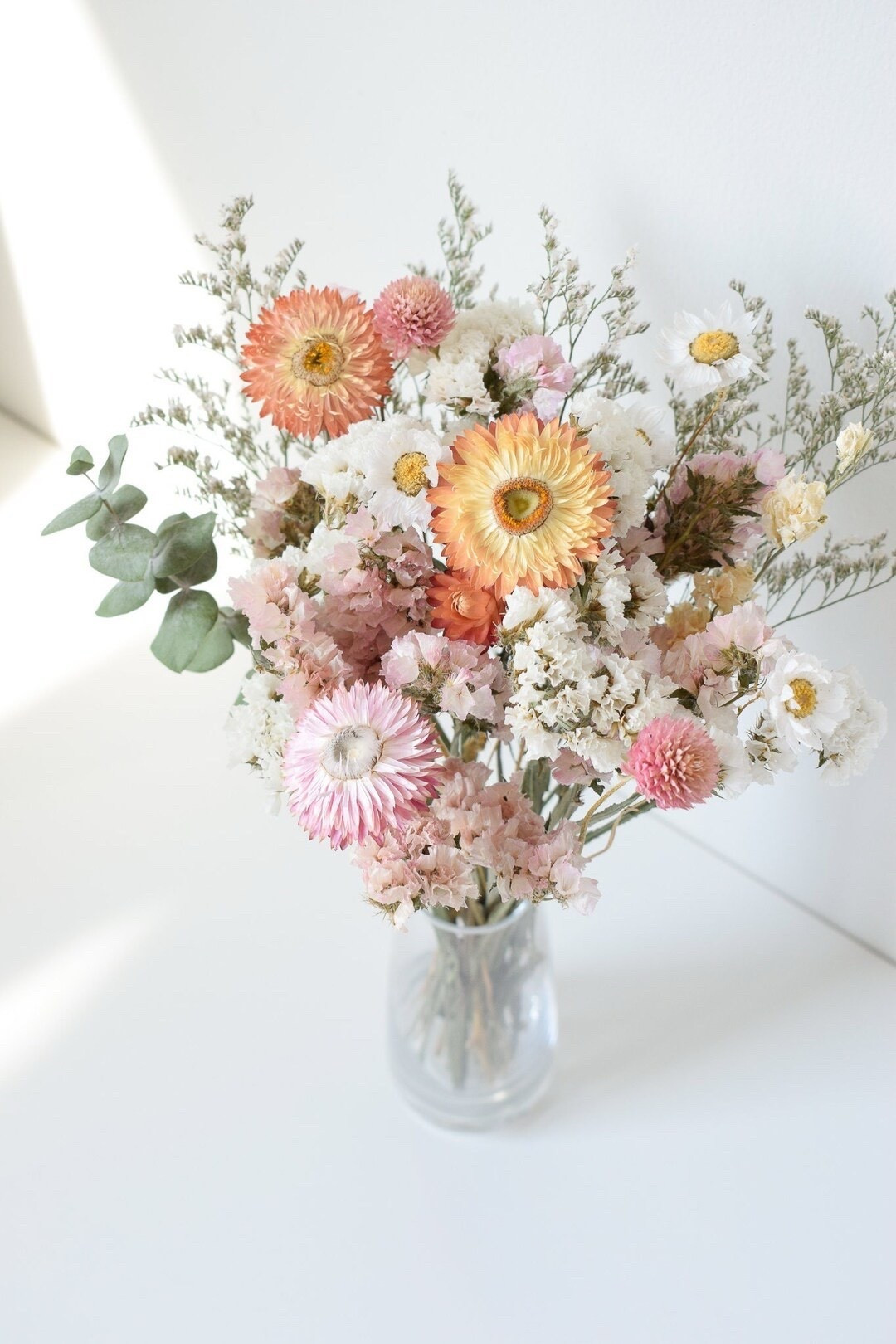 A beautiful alternative to traditional Mother’s Day flowers, this blush and peach dried flower bouquet is designed to be treasured for years to come. Featuring soft romantic tones and delicate textures, it’s perfect for home décor, wedding centerpieces, or gifting someone special. Wrapped in kraft paper and ready to gift, this timeless arrangement brings lasting beauty with zero maintenance. #LTKHome #MothersDayGift #DriedFlowers #GiftIdeas #HomeDecor #WeddingDecor #EtsyFinds #SustainableLiving #FloralDecor #EverlastingFlowers

#LTKHome #LTKSeasonal #LTKWedding