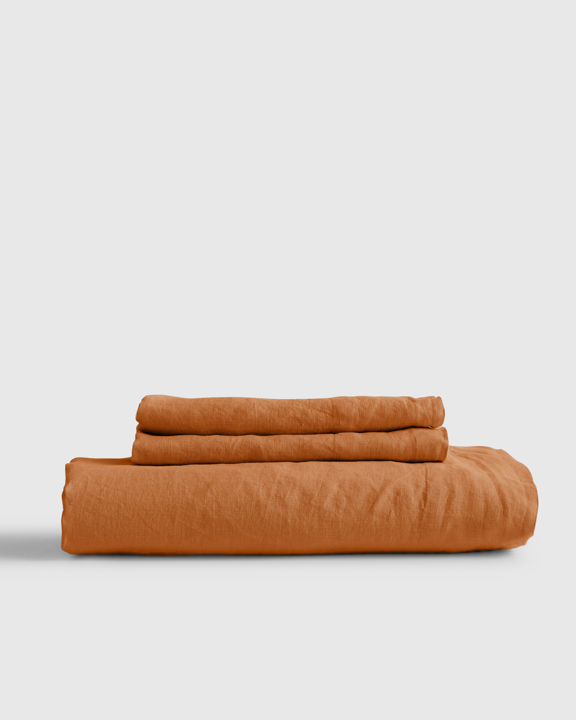 Quince | European Linen Fitted Sheet Set in Terracotta, Size Cal King | Quince