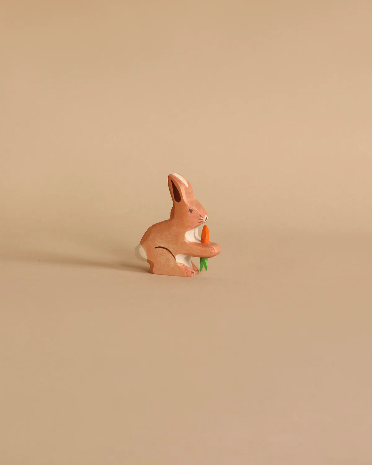 Holztiger Rabbit With Carrot | Odin Parker