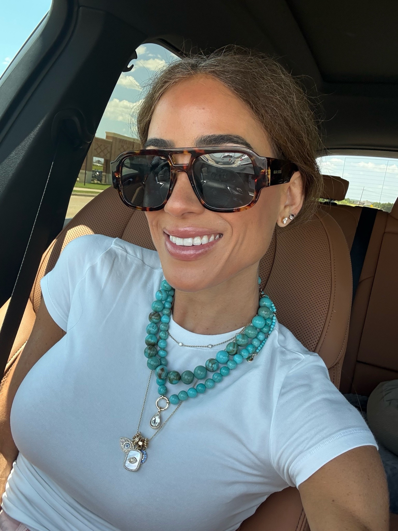 My layered turquoise beaded necklaces and new square sunglasses

#LTKOver40 #LTKootd