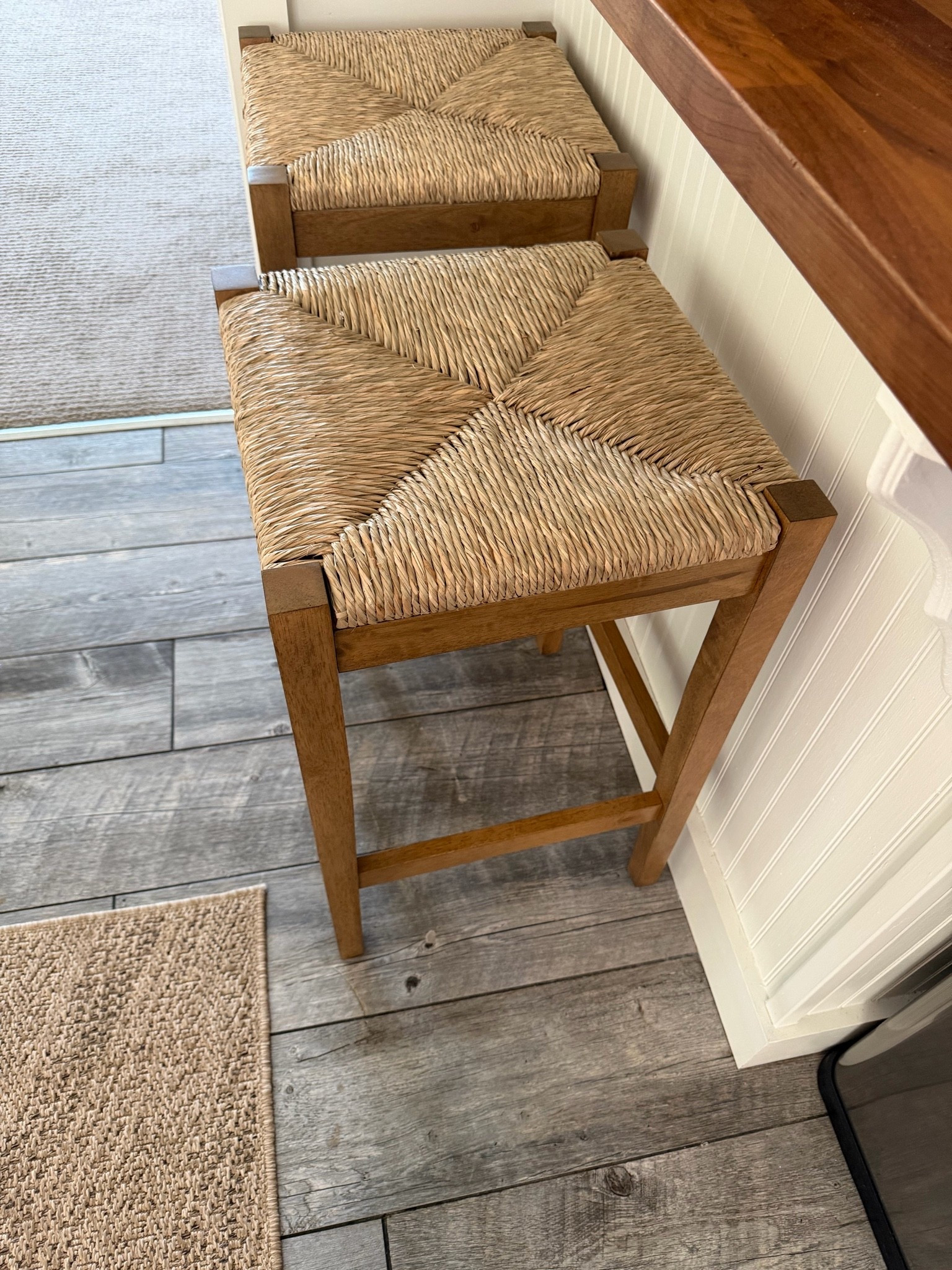 These backless seagrass counter stools are one of my favorite finds. 🤍

The handwoven natural seagrass seat paired with solid wood legs adds the perfect organic texture to a kitchen or dining space. They’re comfortable, timeless, and easy to tuck under your island for a clean, uncluttered look.

Such a beautiful way to add warmth and that designer-inspired feel without overwhelming the space.

#LTKHome