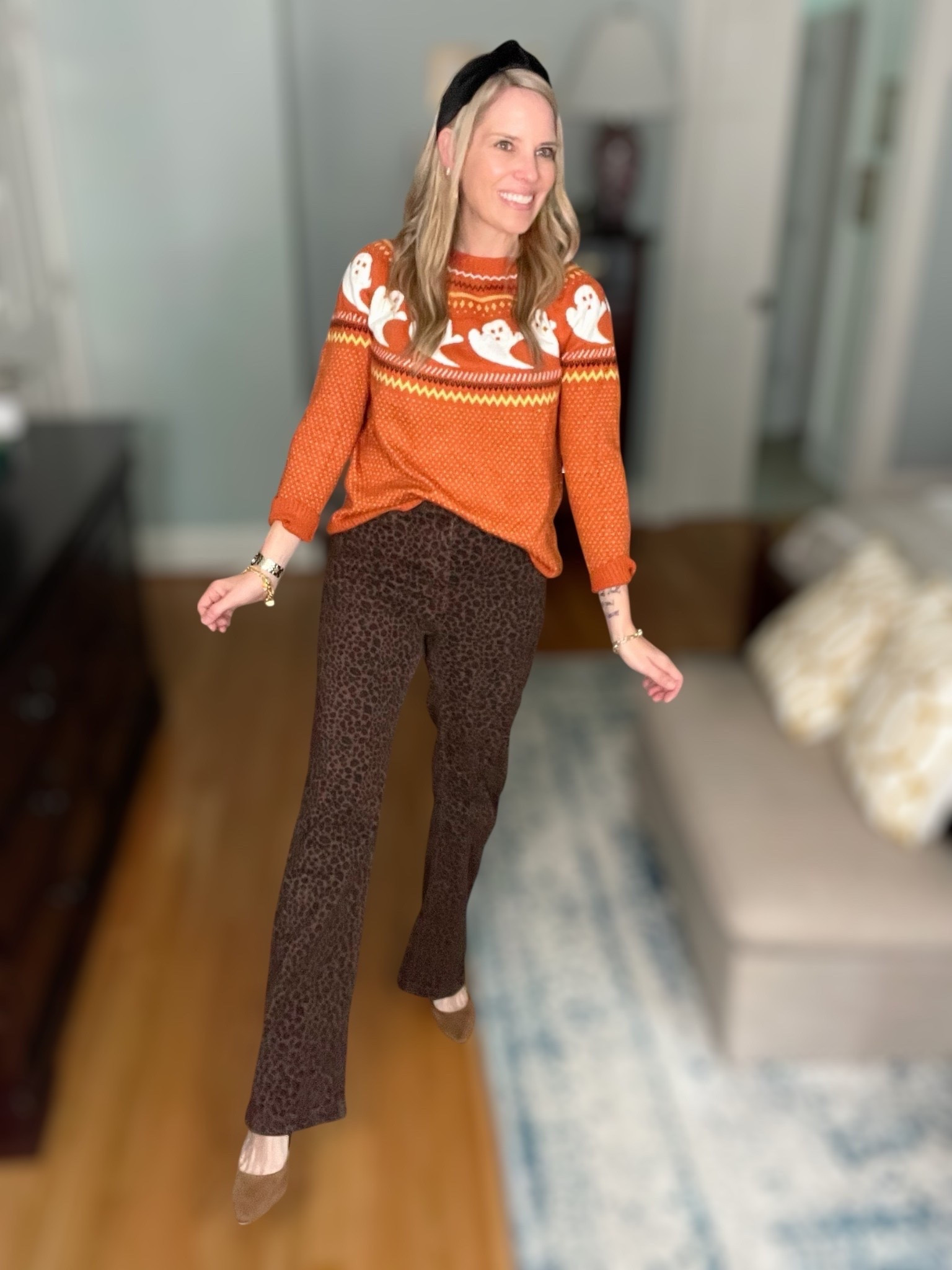 👻 Sweet, spooky, and oh-so-stylish! 🍂 I couldn’t resist this adorable ghost-print orange sweater — it’s festive without being over-the-top and pairs perfectly with brown leopard pants for a fun, fashion-forward twist on fall style 🧡 I added brown suede pumps, a black velvet headband, and gold jewelry for that polished touch that still keeps things cozy.

Perfect for: pumpkin patch days, Halloween parties, or a casual night out with friends — festive fashion never looked this chic! 🕸️✨

🧡 Outfit details:
• Orange Ghost Sweater
• Brown Leopard Print Pants
• Black Velvet Headband
• Brown Suede Pumps
• Gold Hoop Earrings & Chain Bracelet

⸻

M
halloween outfit idea, ghost sweater outfit, fall casual outfit, spooky cute outfit, halloween fashion, fall outfit inspo, leopard print pants outfit, festive fall sweater, cozy halloween look, autumn style ideas, orange and brown fall outfit, preppy halloween outfit, stylish spooky season outfit, fall capsule wardrobe, chic halloween outfit ideas


#LTKFindsUnder100 #LTKFindsUnder50 #LTKHalloween

#LTKOver40 #LTKSeasonal #LTKootd