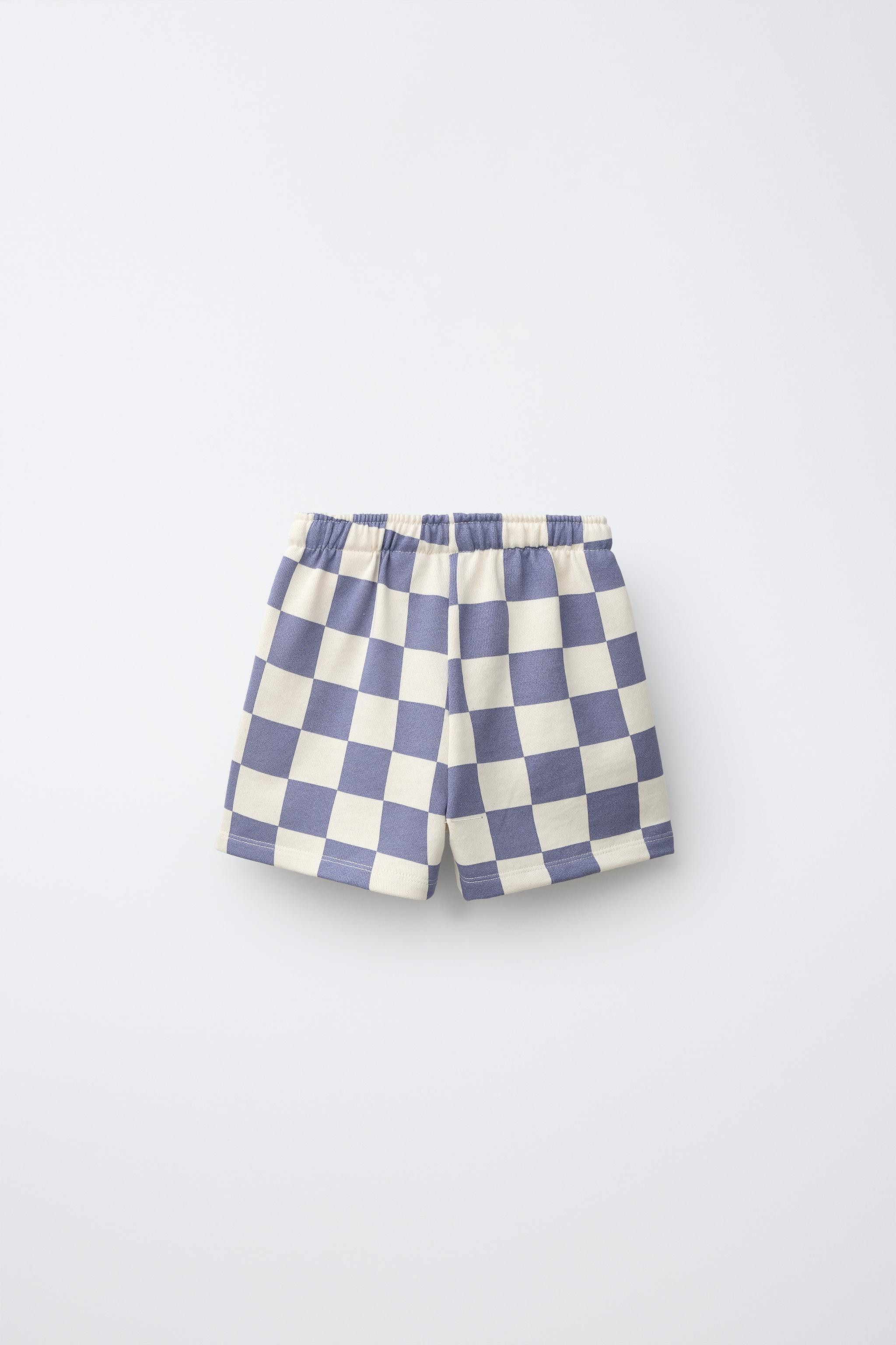 Shorts with an elastic waistband and adjustable front drawstrings. Features a plaid print and SPI... | Zara US