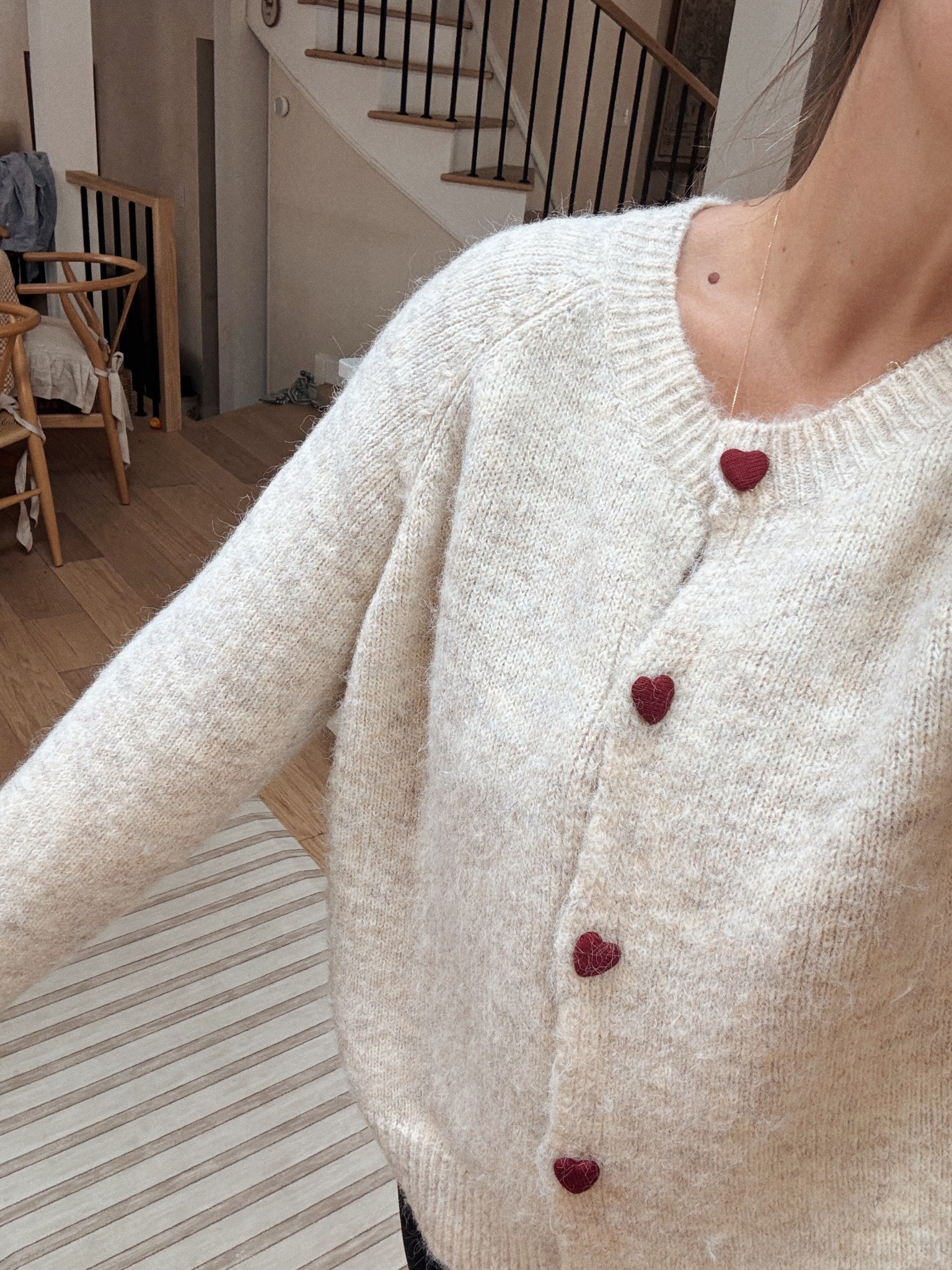 Cozy sweater with heart buttons. I ordered a medium for an over-sized look.