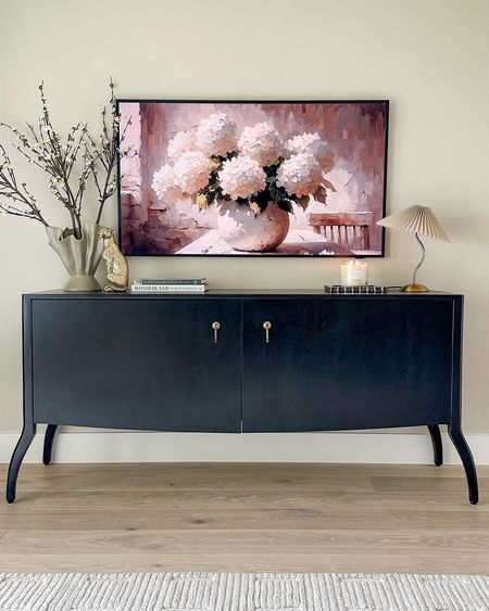 Media console/buffet/sideboard on sale for 20% off! We have a 55” Frame TV paired with it! Such great storage inside as well and obsessed with the modern vintage style!

#LTKStyleTip #LTKHome #LTKSaleAlert