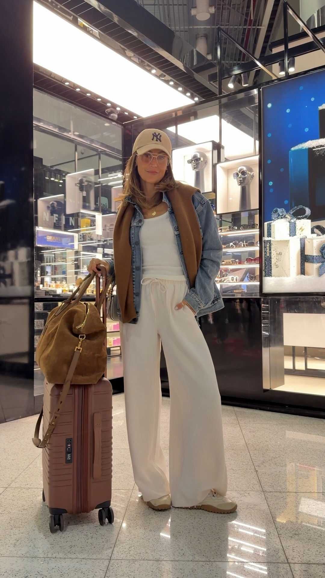 Airport outfit - work these pants on my two last trips and they’re so good! Size small 
Oversized denim jacket and cashmere sweater 

#LTKTravel #LTKSeasonal #LTKOver40