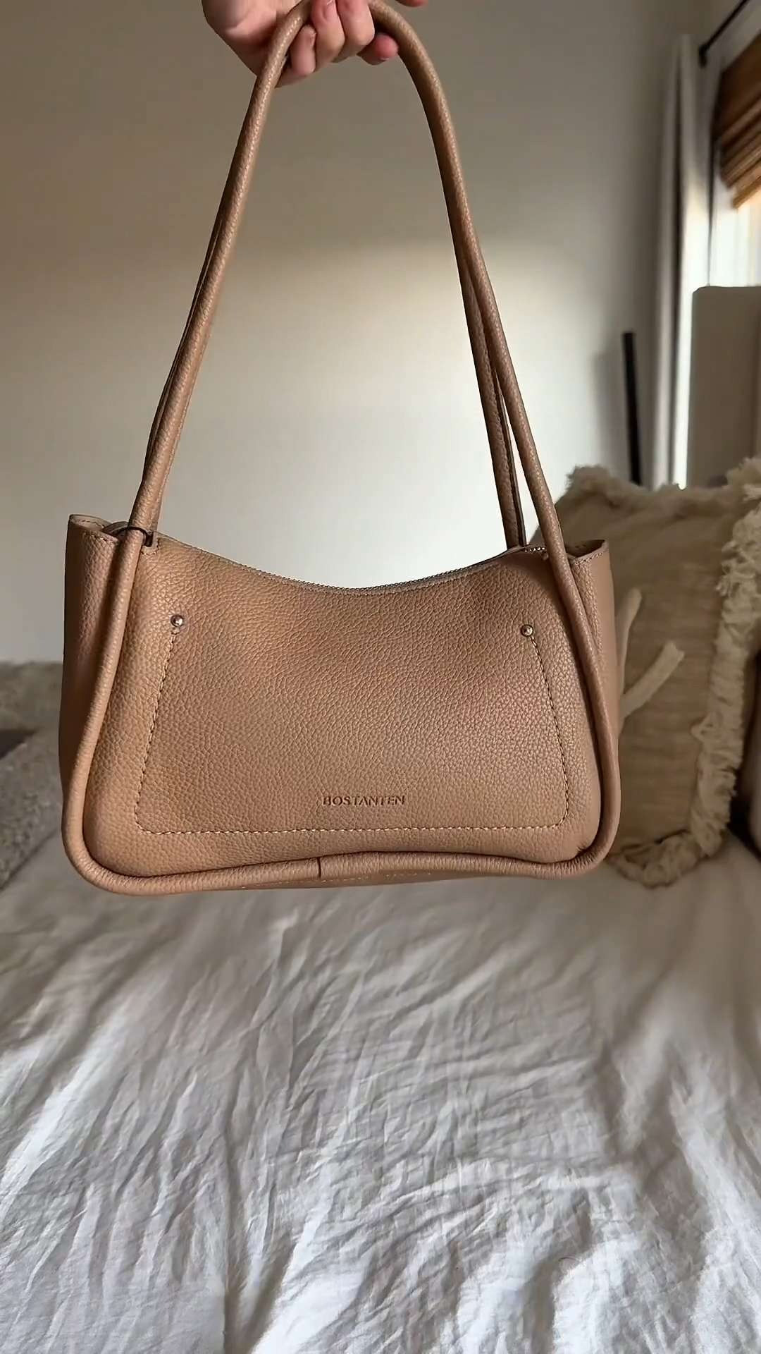 This vegan leather hobo bag has been my everyday carry all summer long! I love how it's the perfect medium size - not too big, not too small. The structured design holds its shape beautifully while still giving that relaxed hobo vibe I'm obsessed with. This brown shade literally goes with every outfit in my wardrobe, from work blazers to weekend casual looks. The quality completely surprised me for this price point - the leather feels so much more luxurious than you'd expect. It's currently on sale for under $25 and I'm honestly considering getting it in another color because I reach for this one constantly 

 #LTKFindsUnder50 #LTKStyleTip #LTKItBag