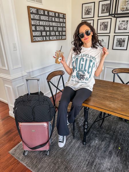 Abercrombie graphic t shirt + black flared leggings! 

Oversized tee // black flare leggings // carry on // weekender bag // high top converse 

#LTKtravel #LTKfindsunder50 #LTKstyletip