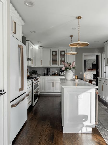 I love a white kitchen! Some may say that they’re going out of style, but to me they’re timeless. I add warmth to our kitchen through hardware, decor, lighting and textiles! 

#LTKStyleTip #LTKHome