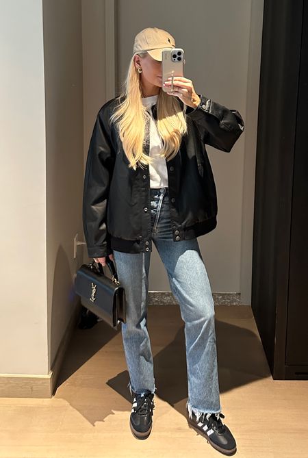 NYC airport travel outfit 🫶🏼 Sized up to med in jacket- not necessary but I wanted it to fit extra oversized. 26 in jeans and I cut the hem. Small in top. Size down whole size in shoes. I’m a 7.5 and I get a 6.5/38  