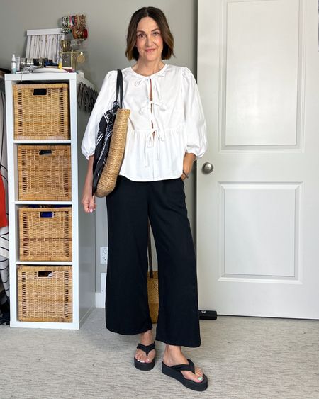 Elevated casual spring look! Wearing my usual size S in the top and linen blend pants. I get asked about what to wear under this top and I personally wear a nude bra, the material is 100% cotton and fairly structured so just tie it close together and there won’t be a gap in the middle.
Also linked the scarf, it comes in a set of three colors and is the perfect size to tie in your hair or around a bag handle!
My platform flip flops and straw bag are from last year but I linked similar


#LTKShoeCrush #LTKItBag #LTKStyleTip