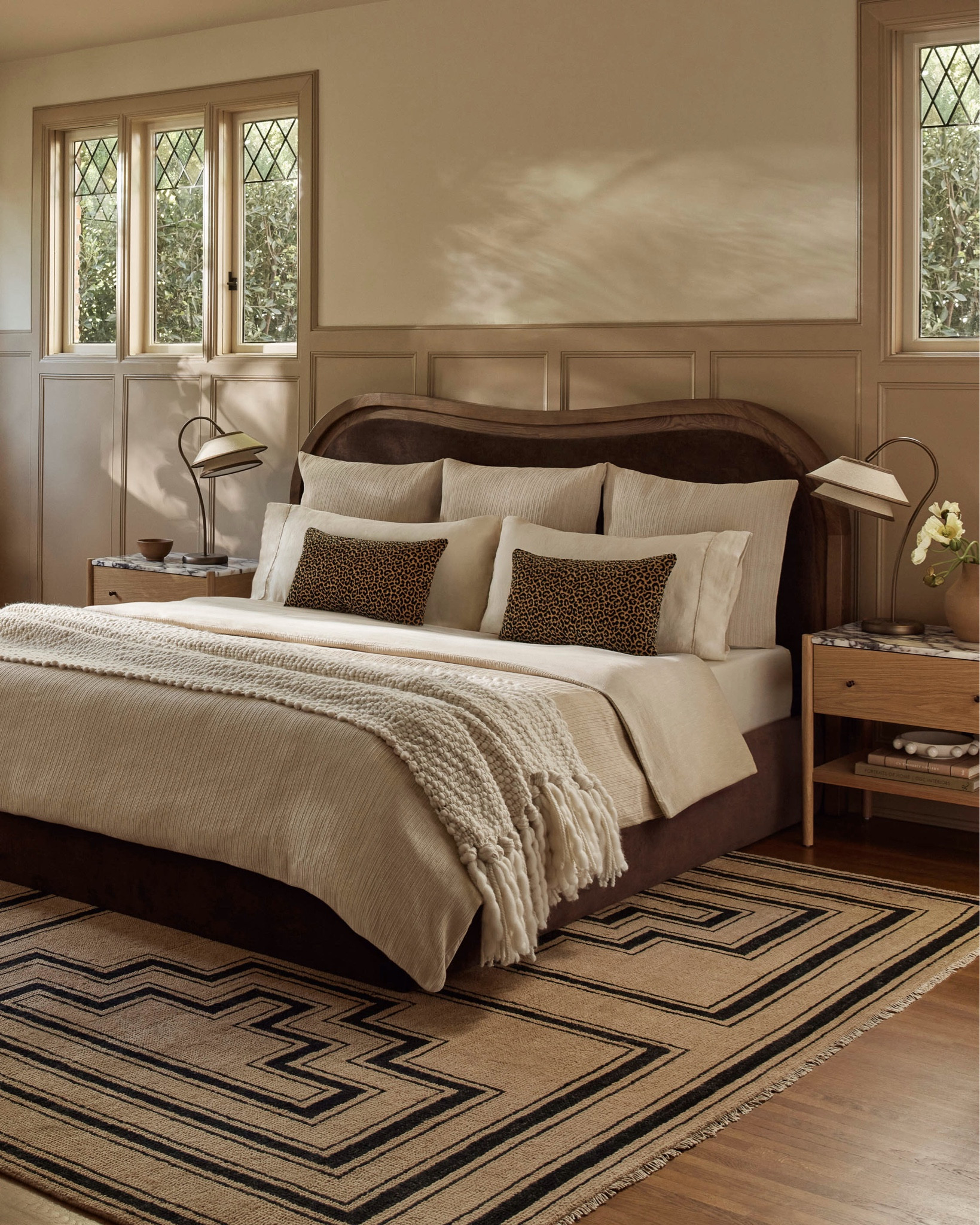 The Greenbury bed offers an Art Deco take on the wave bed—styling on-trend appeal with timeless roots. A stepped-down solid ash border provides a natural grain touch to the headboard, which is upholstered to match the trimly tailored bed frame for a soft, modern touch. The result is a stunning bedroom centerpiece that is warm, inviting, and utterly chic. #bedroom #vintagebed

#LTKHome