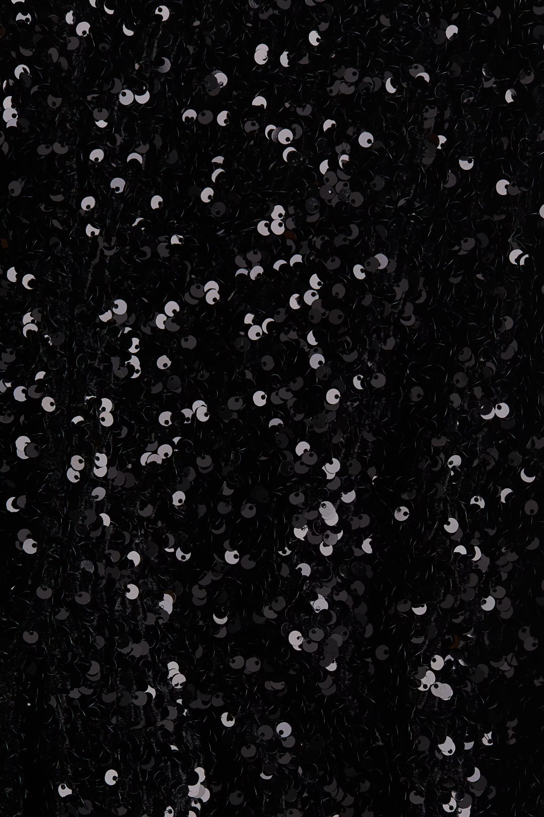 Pantaloni svasati con paillettes | H&M (FR, IT, ES, PT, BE)