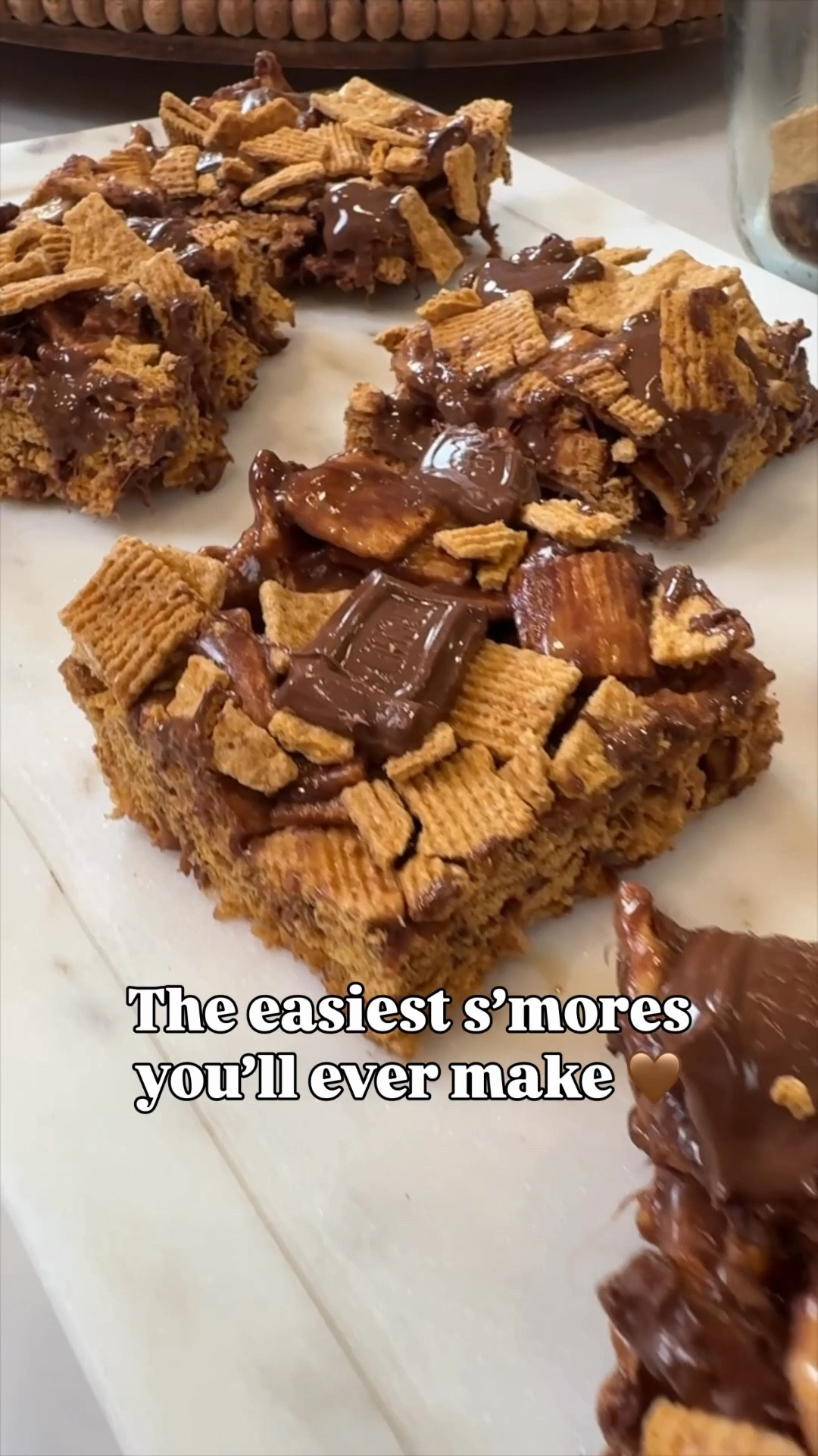 These S’mores Bars are what I make when I want something EASY but still gives that ooey-gooey, everyone-grabs-seconds kind of vibe 🤎🔥

Think classic campfire s’mores… but no fire, no mess, and ready in one pan 🙌

Ingredients:
✨ 7 cups Golden Grahams cereal
✨ 1/4 cup butter
✨ 1 (16 oz) bag mini marshmallows
✨ 1 cup mini chocolate chips
✨ 8 snack-size Hershey bars

Quick how-to:
Melt butter on low, stir in marshmallows until smooth and gooey 🤍
Mix in 6 cups of cereal (save 1 cup for the top!)
Let it cool slightly, then fold in chocolate chips
Press into a greased 9x13 pan, top with remaining cereal + Hershey bar pieces
Let set, slice, and try not to eat half the pan right away 😅

These are SO good for summer parties, movie nights, or just a fun treat with the kids 🫶 linking everything you need!

#LTKFamily #EasyDesserts #NoBakeTreats #SummerTreats #Smores 

#LTKHome #LTKmomlife #LTKfoodie