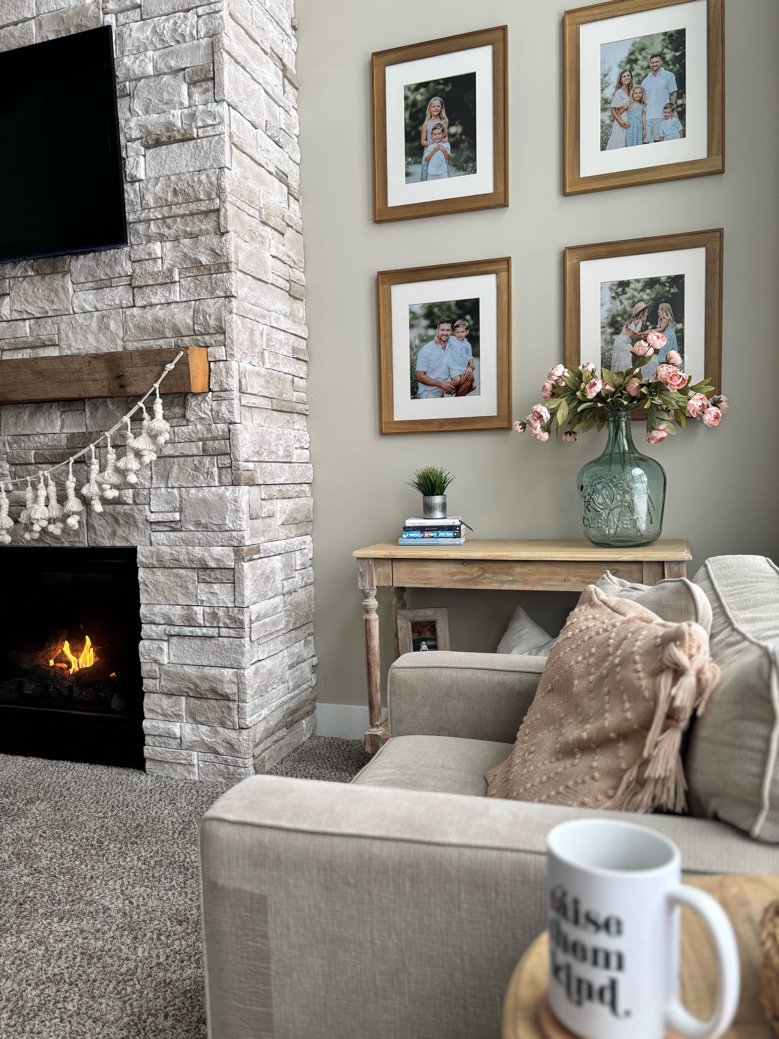 Living room console table and gallery wall. Peony faux flowers, radley chair. 

#LTKHome
