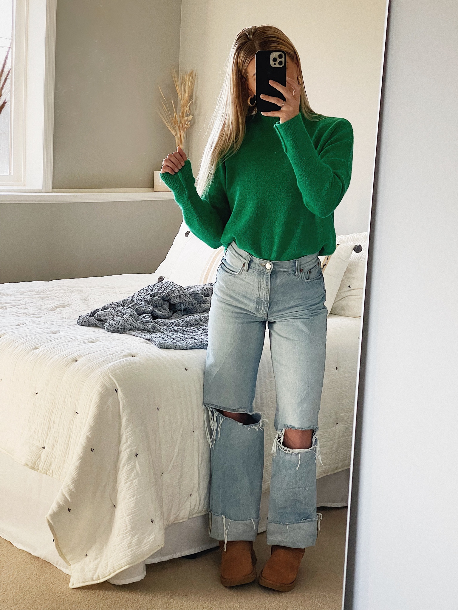Wide leg distressed jean, green turtleneck, mini Uggs — #ootd

#LTKshoecrush #LTKSeasonal #LTKstyletip