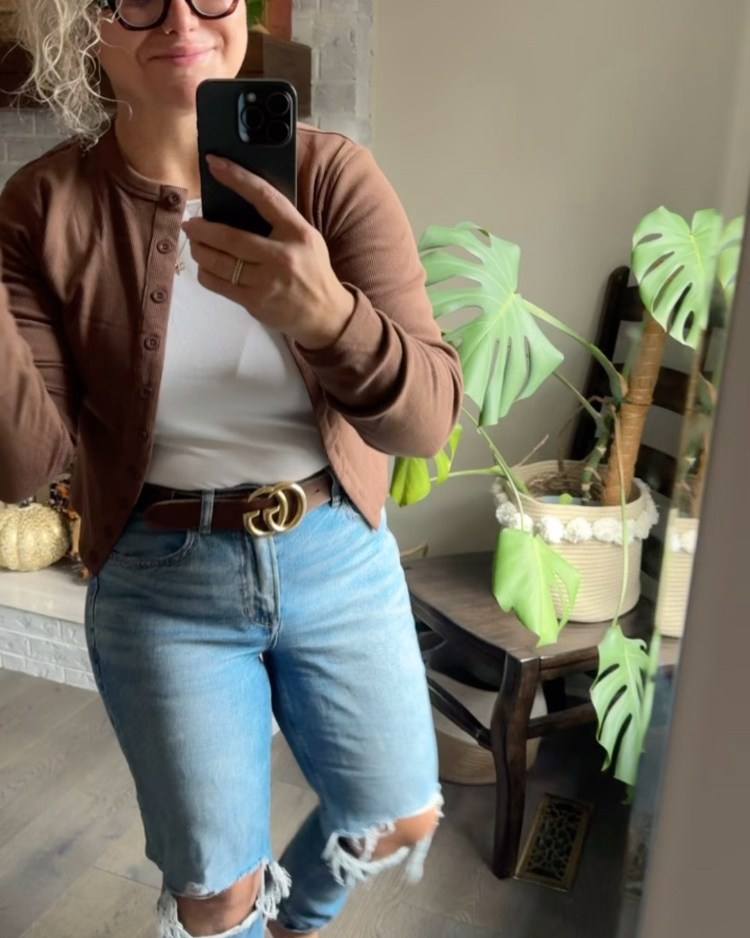 Favorite Amazon purchase lately is this CUTE cropped-ish cardigan. Thicker then it looks with a ribbed material in the most perfect shade of brown. Wearing a medium. 

Jeans are a classic distressed mom Jean that I bought last year. Wearing a 6, usually wear a 28 waist. (On sale!)

Shirt is one of my favorite basics. Wearing an XS - has an oversized fit so I sized 2 down  

#LTKfall #LTKjeans #LTKsale