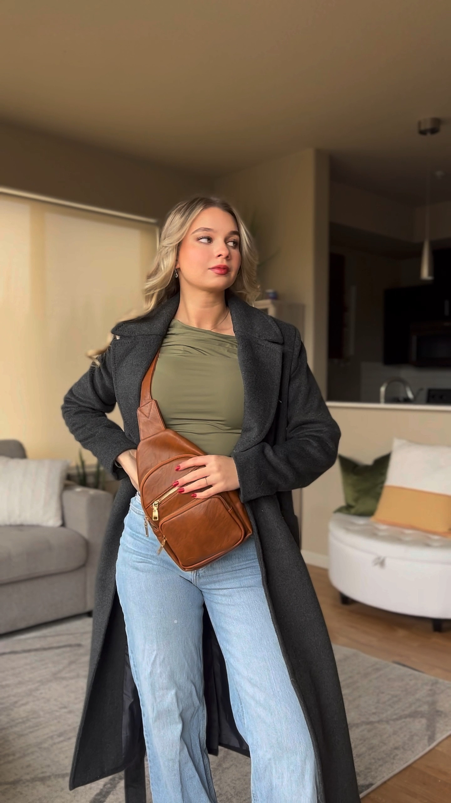 Add elegance to your wardrobe with an off the shoulder long sleeve top, and a wool blend trench coat. Jeans are from H&M and the sling bag is from Amazon (waiting for link) and Dior lipgloss 

#LTKVideo #LTKstyletip #LTKSeasonal