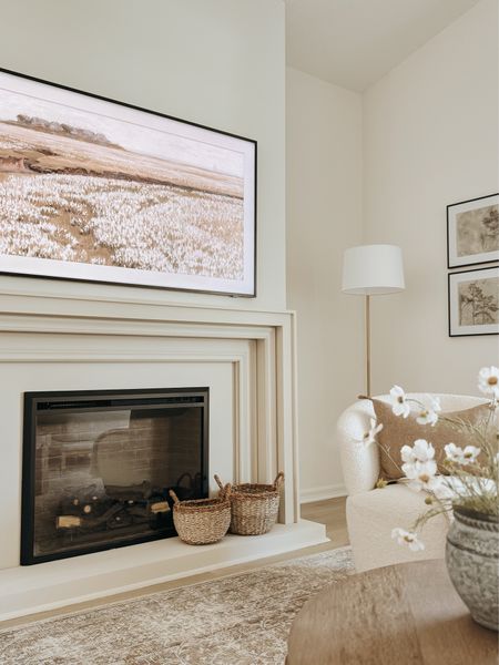 Electric fireplace insert and spring frame tv display linked 🤍

#LTKSeasonal #LTKhome