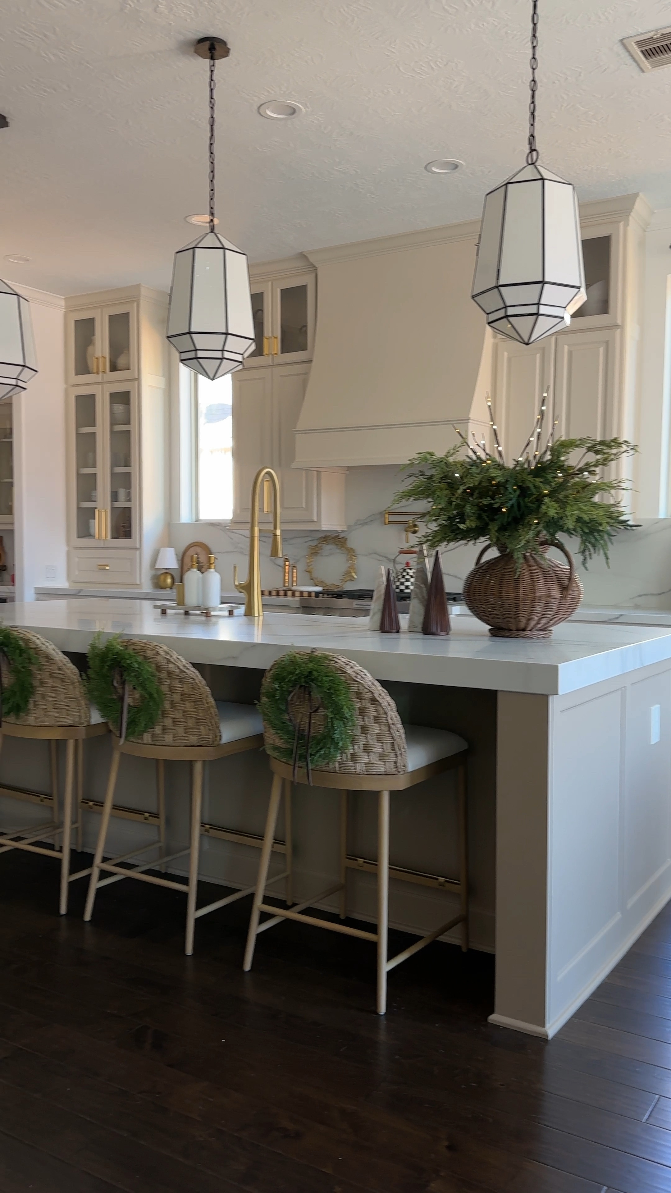 Holiday kitchen vibes. Keeping my kitchen minimal for the holidays. Added mini wreaths to my counter stools and a couple of accessories to the kitchen. My favorite is the xl gingerbread house from MacKenzie-Childs. 

#LTKCyberWeek #LTKStyleTip #LTKHome