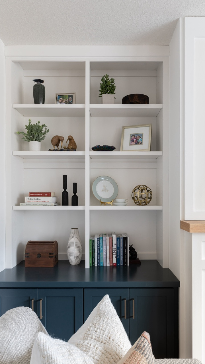 Before and After ➡️ When it comes to bookshelf styling, be sure you’re grouping objects together, especially if they’re small. Doing so helps to create visual balance and focal points. Also, consider layering items here, quite literally. For example, a small dish layered on books. Happy styling!

#LTKHome #LTKvlog #LTKSaleAlert