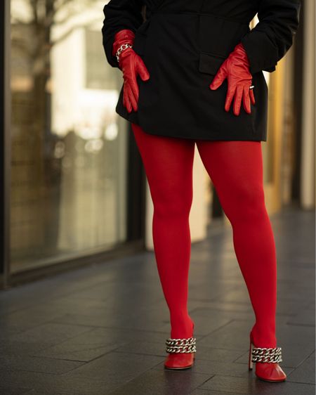 Red shoes, tights and gloves with silver chunky bracelets 
