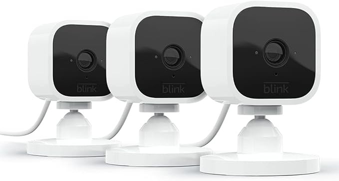 Blink Mini - Compact indoor plug-in smart security camera, 1080p HD video, night vision, motion d... | Amazon (US)