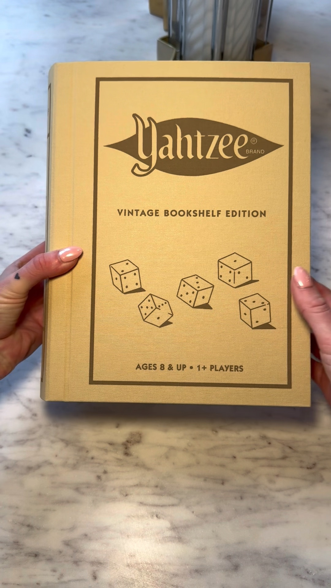 Yahtzee vintage bookshelf edition available on Amazon in a set or individually 
This full size game board looks amazing on the shelf and is so much fun for family game night!