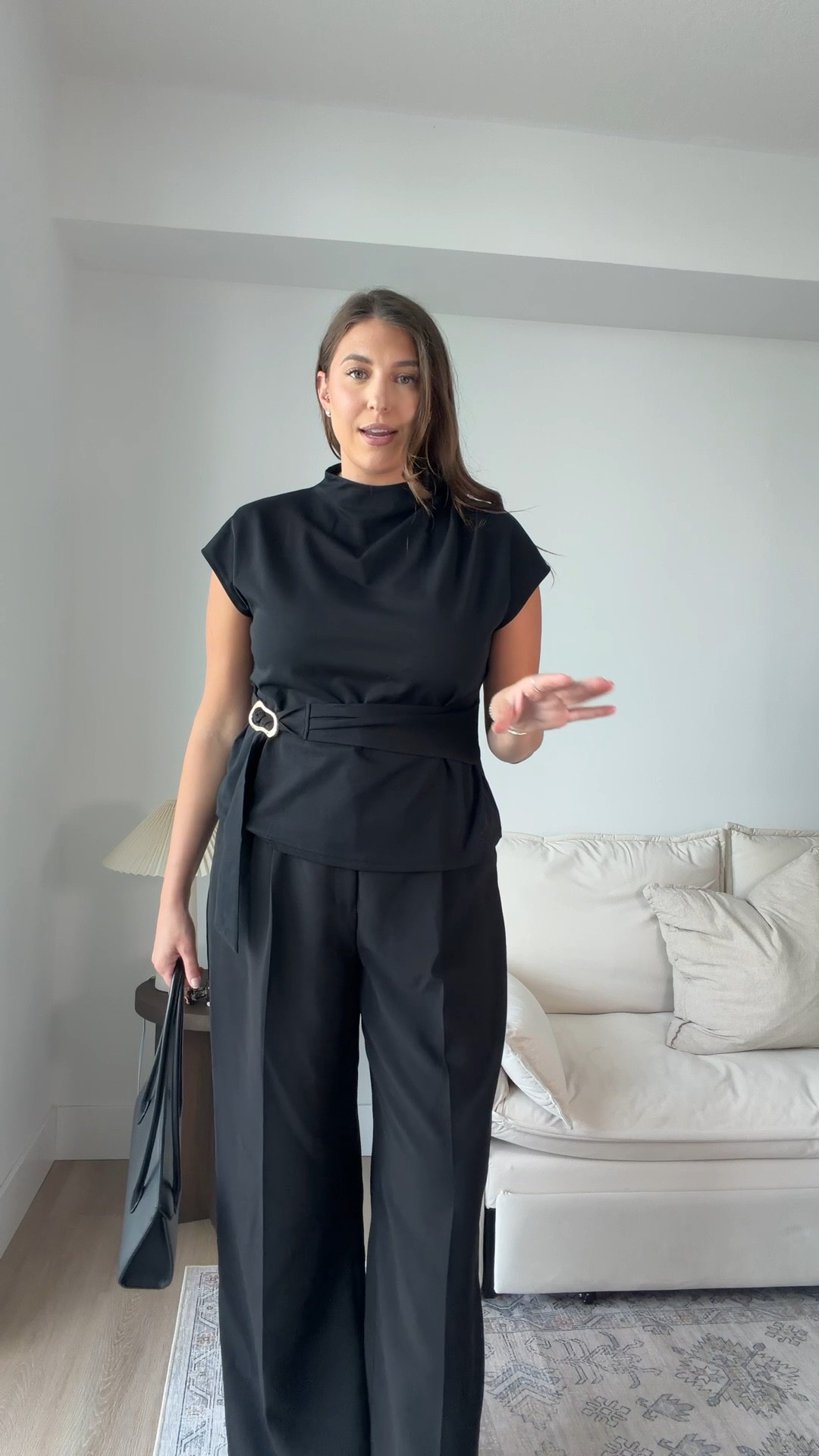 This is my favorite kind of outfit: polished but comfortable. A structured black top with tailored wide leg pants instantly makes you feel put together without trying too hard. Perfect for work days, meetings, or dinner plans when you want effortless chic.

Keywords:
black outfit, work outfit women, business casual outfit, tailored pants, wide leg trousers, chic black outfit, elevated basics, office outfit inspiration, minimalist style, polished look, capsule wardrobe, everyday chic

#LTKWorkwear #LTKMidsize #LTKTall