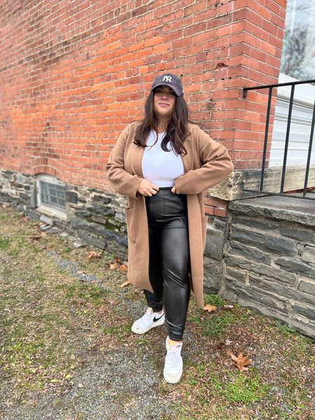 Spanx joggers
Black joggers
Camel coat
White shirt
White bodysuit
Nike blazers
Baseball hat 

#LTKcurves #LTKworkwear #LTKfit