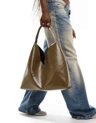 ASOS DESIGN slouch tote bag with crossover panel detail in khaki | ASOS (Global)