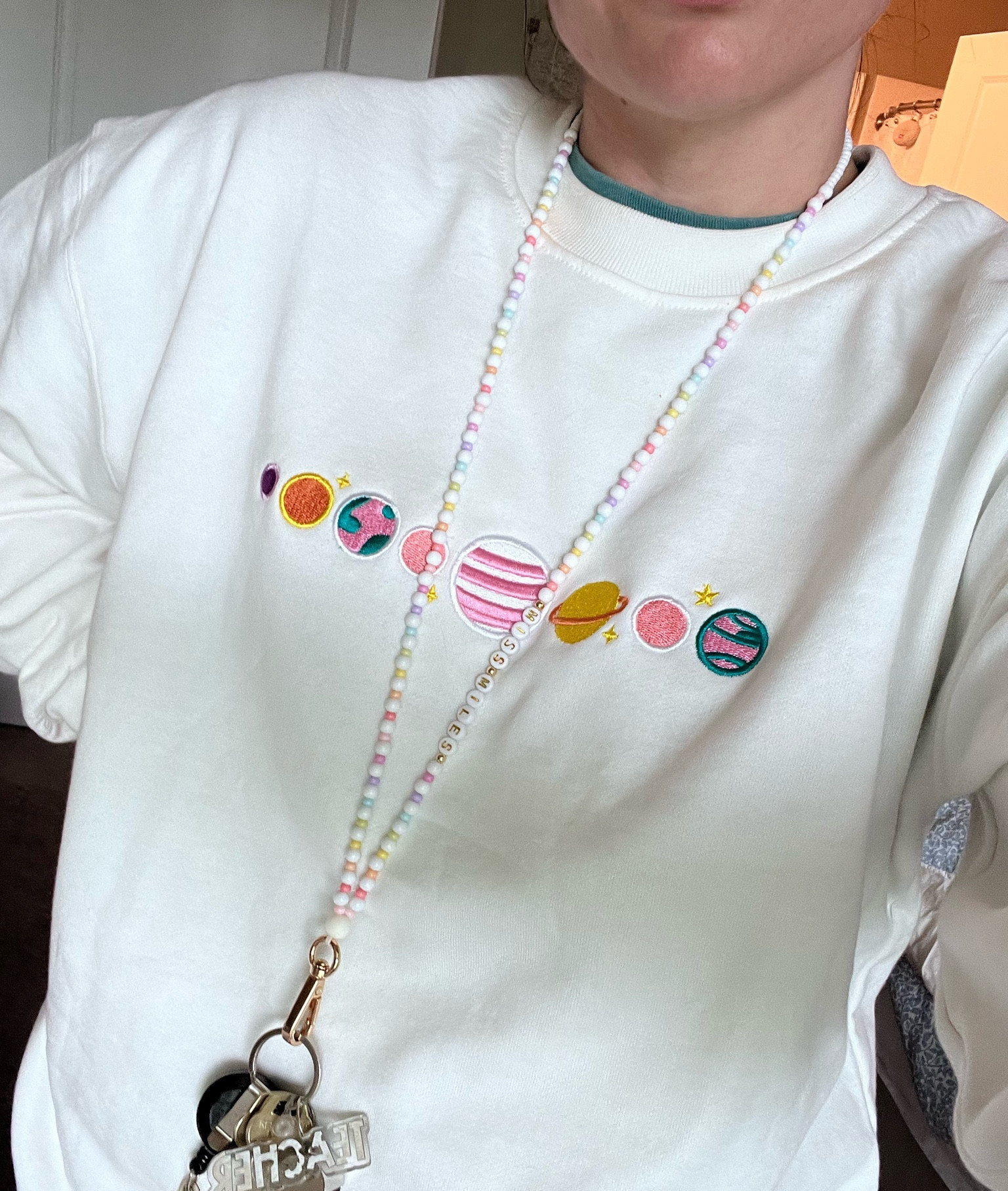 Space themed teacher sweatshirt 

#LTKmidsize #LTKfindsunder50 #LTKworkwear