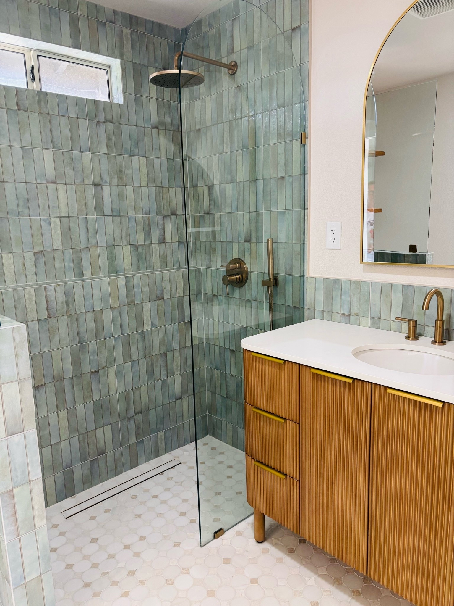 Check out this gorgeous blue/green tile that was a budget find from Home Depot!  We covered all the walls in tile so it worked out that we found a tile for under $10 a square foot

#LTKHome