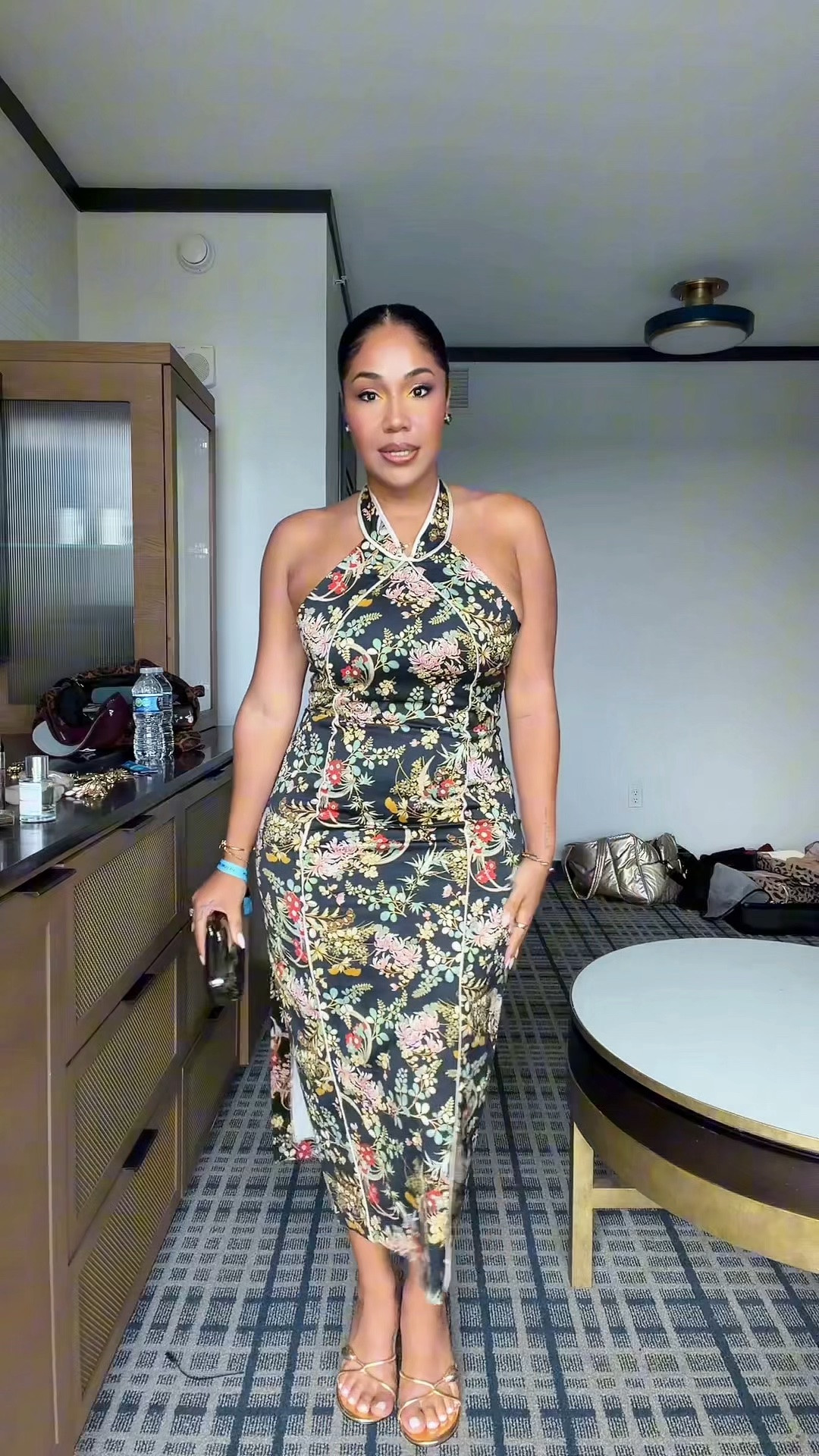 The backup dress that ended up stealing the show 🖤✨ I originally bought this one for NYFW, but threw it in my suitcase for LTKCon just in case — and thank God I did. 😂 When my first choice for the Macy’s Finale Party just wasn’t falling the way I wanted, we called an audible, and I’m SO glad we did. The neckline was already doing enough, so I kept the jewelry minimal with little black floral studs, added a gunmetal bag, and gave my very tired feet a break by bringing back the heels from the night before. 😂 And because apparently I will find any excuse to sneak yellow into a look, the little pop in my inner corner had to make an appearance. 💛 Everything I’m wearing is linked, plus similar options for the earrings + bag! #LTKCon #LTKStyleTip #LTKFashion