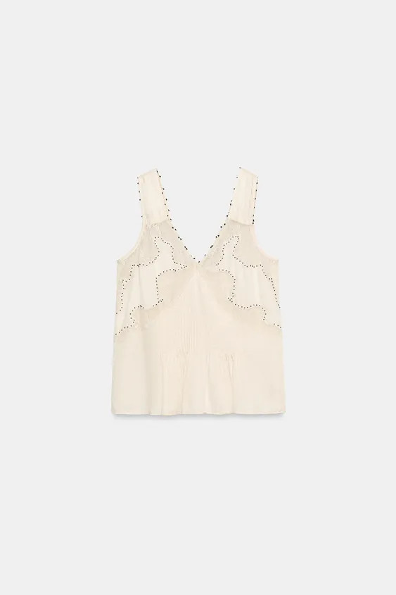 Model height: 178 cmV-neck top with wide straps and bead embellishments. Featuring a combination ... | Zara NL