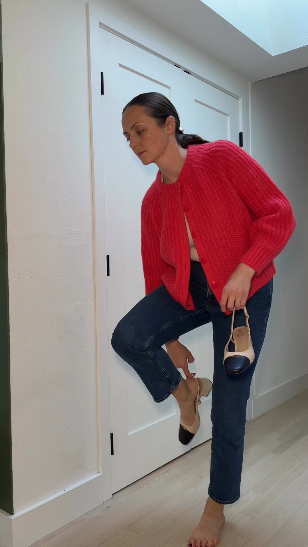Red cardigan from Sézane, dark straight leg jeans, slingback pumps create a timeless outfit that will be relevant even 10 years from noww

#LTKShoeCrush #LTKOver40 #LTKSeasonal