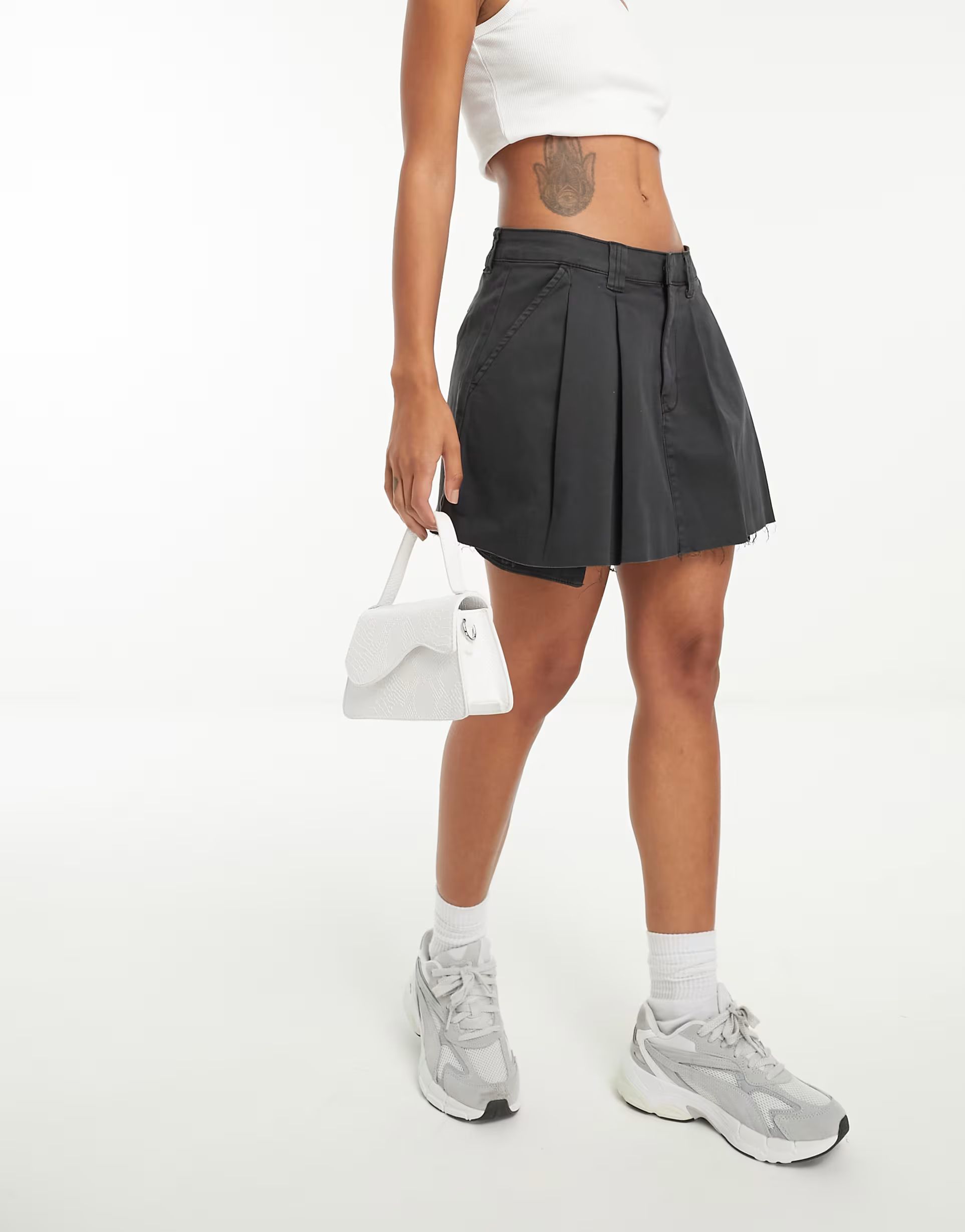 ASOS DESIGN pleated mini skirt in washed black | ASOS (Global)