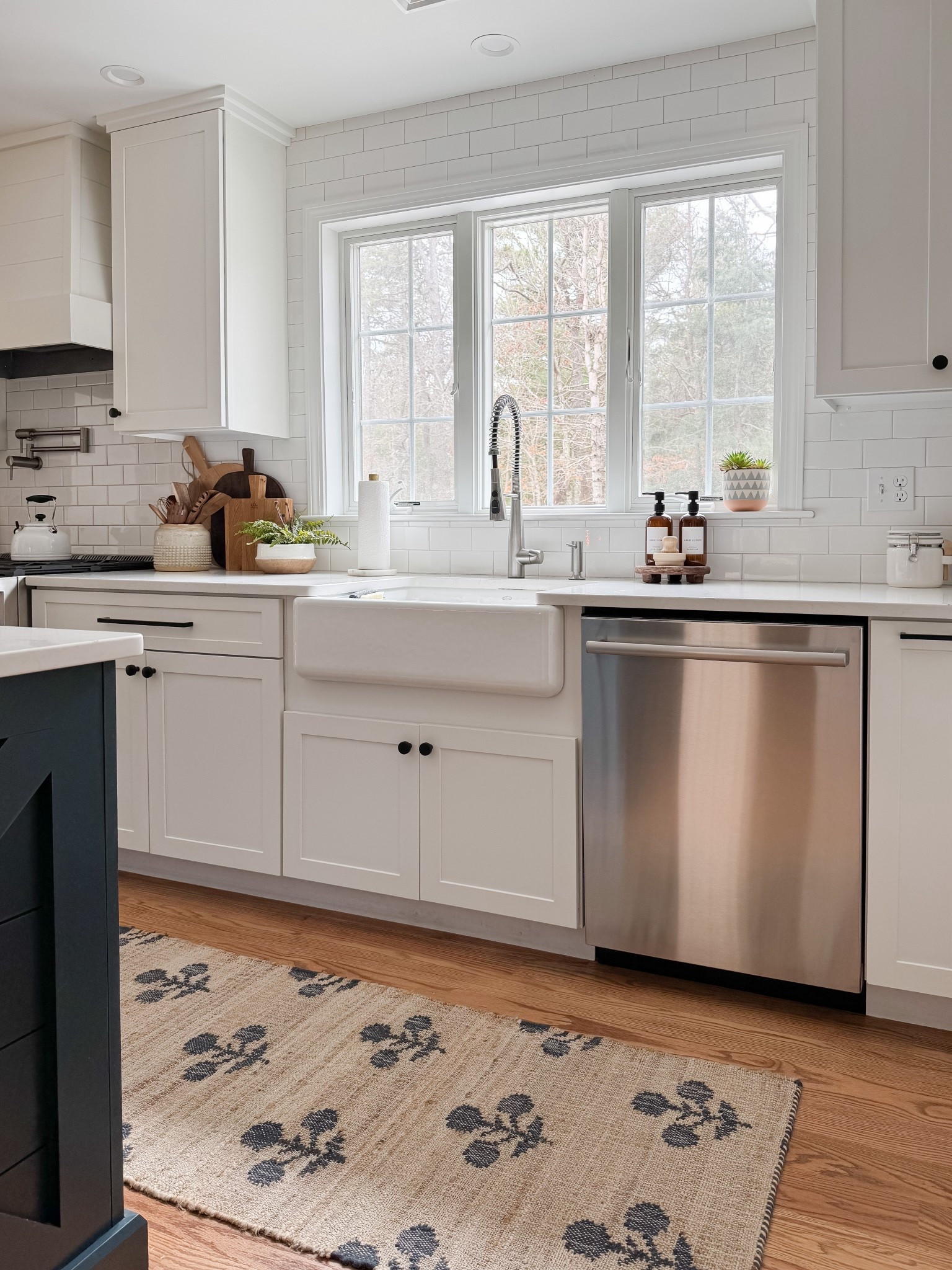 Coastal kitchen styled with navy island, white cabinets, neutral runner rug, and simple kitchen decor for a light and layered coastal space.

coastal kitchen decor, navy kitchen island, neutral kitchen runner rug, white cabinet kitchen, coastal kitchen styling, neutral kitchen decor, light coastal kitchen design, kitchen island runner rug, sherricalnanhome

#LTKHome