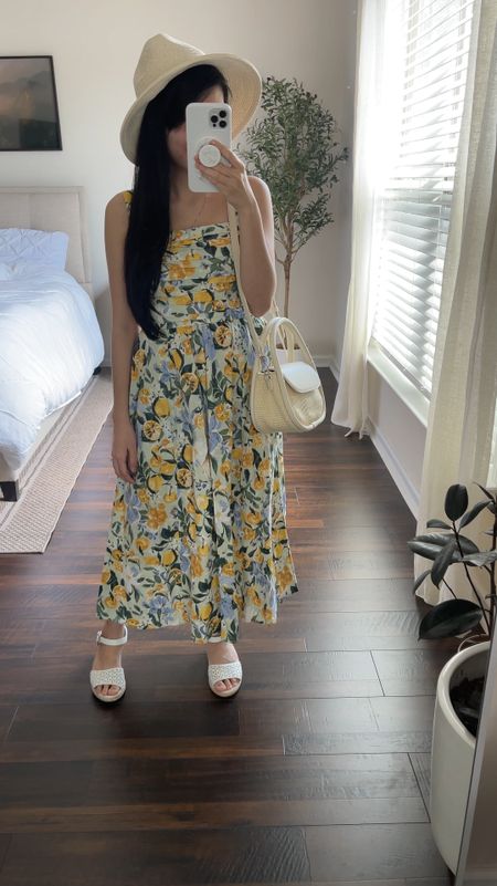 This gorgeous lemon midi dress is back in stock! 😍👗 🍋 I love the colors on this and it’s perfect for summer! Details include side pockets , adjustable wide straps, & it is very petite friendly. I think it is travel friendly as well because it doesn’t wrinkle as much! I packed it for my vacation to the Amalfi Coast! 🌊 This dress sells out pretty fast so be sure to get asap! 

- Wearing in size XSP.

#LTKeurope #LTKfindsunder100 #LTKVideo