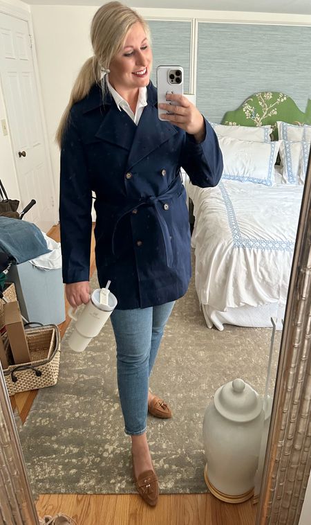 Love this navy trench coat now on sale! Such a great staple piece! School pick-up fall essentials including this classic trench coat, tassel driving loafers, white no-iron shirt, ankle jeans (great price!) and Stanley cup.

#LTKSeasonal #LTKsalealert #LTKover40
