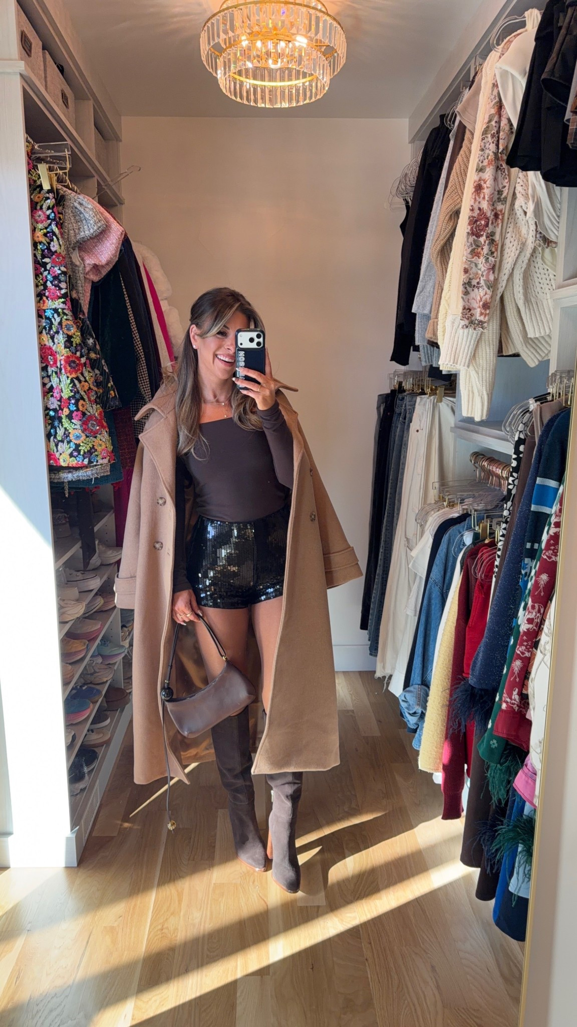 Black Friday deals at Abercrombie black sequin shorts styled with brown long sleeve top and camel coat with boots

Abercrombie code: CYBERAF
Electric picks code: emerson20

Wearing xs in shorts
Smalls in tops & coats

Holiday outfits
Sequin shorts
Winter coats
Long sleeve tops
Date night
Winter coat

#LTKSeasonal #LTKCyberWeek #LTKHoliday
