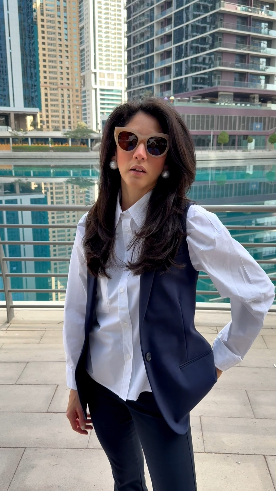 Work wear basics: Oversized shirt, sleek vest, cropped pants, loafers, pearl earrings 

Prendas básicas para la oficina: Camisa, chaleco, pantalones, mocasines y perlitas 

#LTKTravel #LTKWorkwear #LTKootd