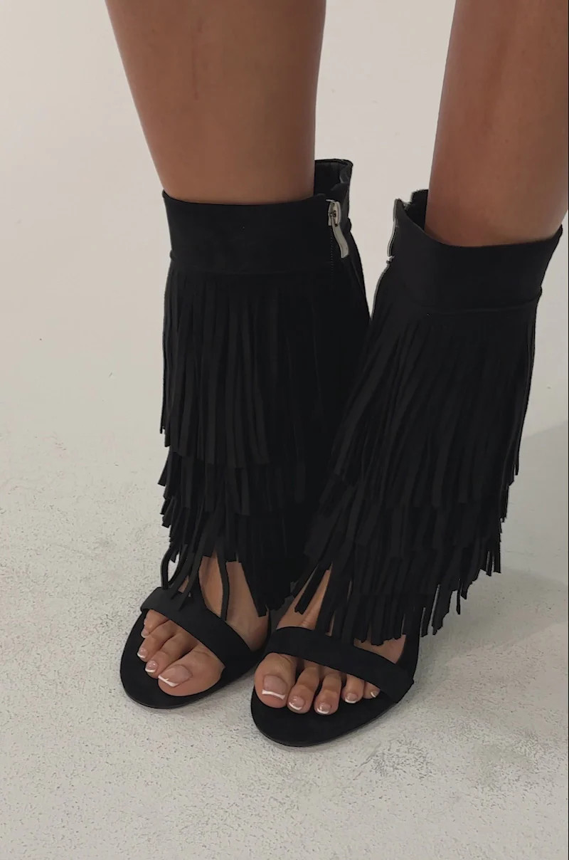 AKIRA GOLD SESTINA BLACK FAUX SUEDE FRINGE WEDGE SANDAL | AKIRA