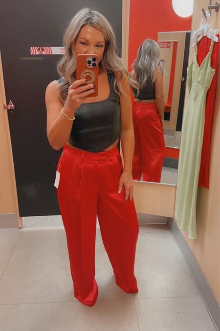 Some fun holiday (or anytime) red satin pants , available in other colors. Wearing size 4 and small faux leather bralette tank.  Target. 

#LTKworkwear #LTKSeasonal #LTKfindsunder50