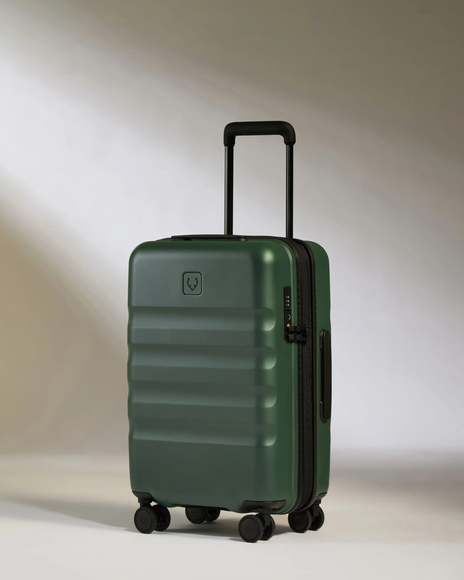 Expandable Carry-on Luggage in Green - Icon Stripe | Lightweight & Hard Shell Suitcase | Antler USA
