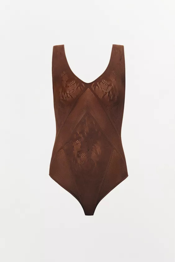 Fitted semi-sheer bodysuit with a V-neck and sleeveless cut. Tonal lace detail. Hidden snap butto... | Zara US