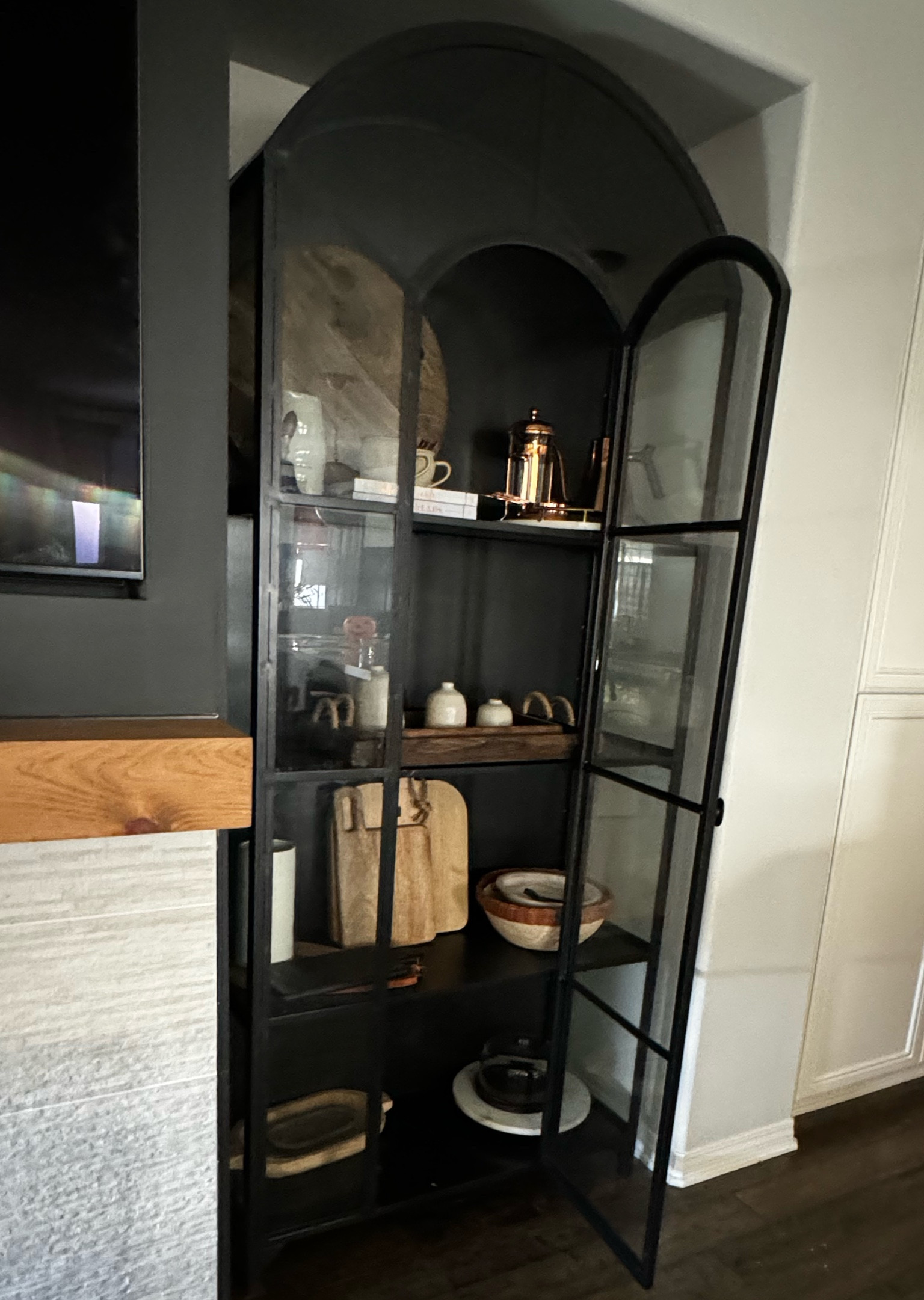 The Vendanda/Belmont cabinet. It is an icon, now available in double width. We purchased in Nov 2019 via our Havenly designer but sourced from Crate and Barrel. It is not easy to get a picture because of the glass reflection! It’s is the statement jewelry of our living room, and the star of the show! 
We utilize as decorative storage for various serving pieces but it can store a full 12 piece porcelain set in the bottom half alone - we’ve tested it out! Only 39 inches wide so it can fill most smaller wall spaces and go for the double wide for wider walls!
Make sure you price shop between Crate & Barrel who has special offers for card members but also a handling fee vs. Scout & Nimble who will run occasionally 20% off Four Hands, and has free shipping. 
#storagecabinets
#blackmetalcabinets
#bookcases
#crateandbarrel
#priceshop
#builtins
#sheflie 


#LTKSeasonal #LTKHome