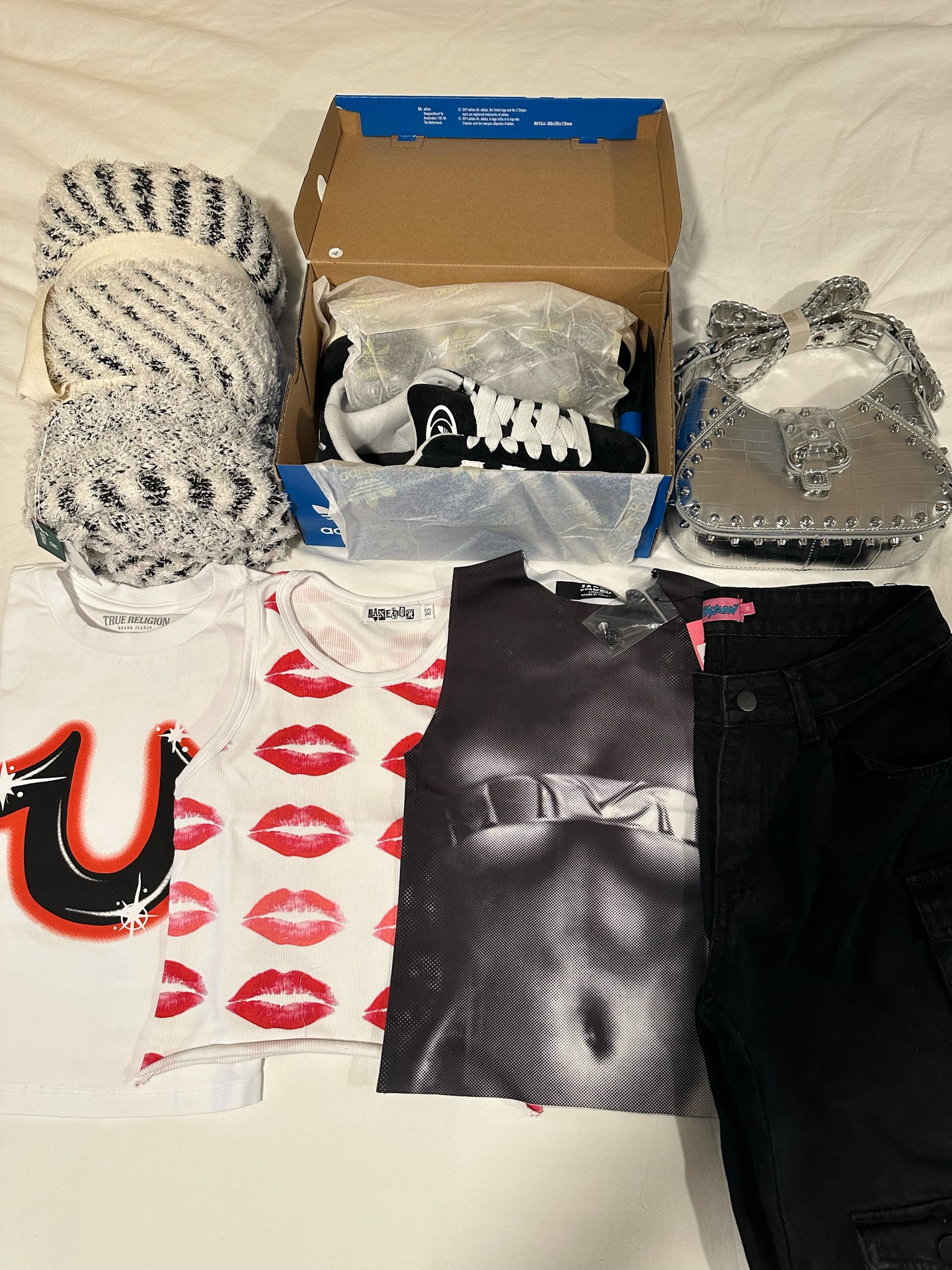 Blanket, Purse, True Religion, and Kisses tank are sold out. B&W tank from Jaded London and Cargos from Edikted  

#LTKstyletip #LTKU #LTKFind