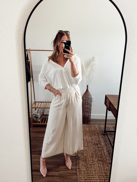 Wearing a medium long in the trousers. My white button down is sold out, but I linked a similar option. Wearing an 8.5 in mesh heels-the heel on are about 1.5inches 