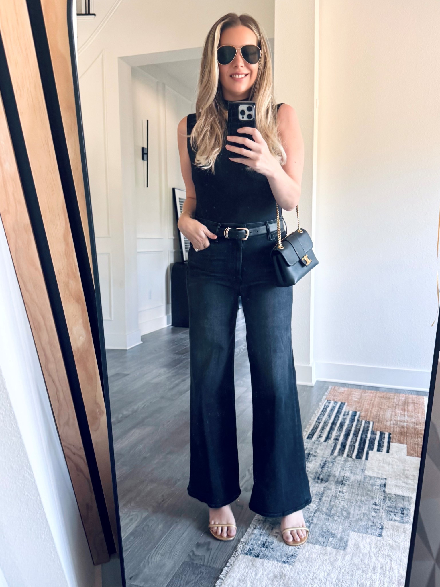 Been wearing these black denim Mother jeans on repeat abs gushed on sale for Saks Friends and Family Sale! So comfortable and cute. 